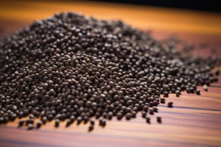 macro shot of a pile of cannabis seeds on a wooden tableの素材