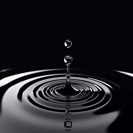 Water drop fell on the water surfaceの写真素材