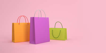 3D paper bags on a pink background. Online shopping concept. 3D illustrationの写真素材
