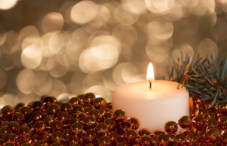Christmas candle with copper coralの写真素材