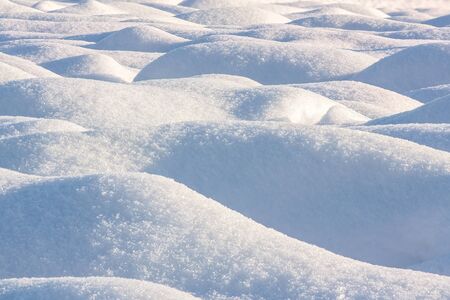 waves on a snowy fieldの写真素材