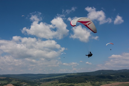 The air of excitement on a paragliding wingの写真素材