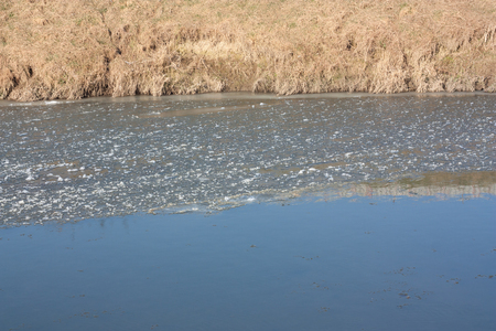 freezing river with crushed iceの写真素材
