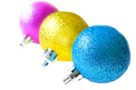 Three colored Christmas ball on a white backgroundの写真素材