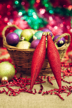 Christmas decorations in a wicker basketの写真素材
