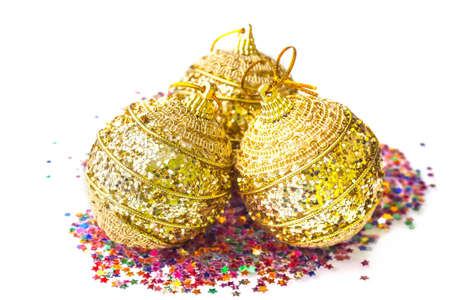 Golden Christmas ball on a white backgroundの写真素材