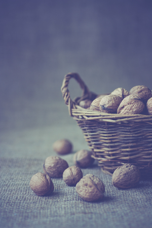 basket with nuts in vintage styleの写真素材