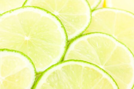 sliced limes in a white bowl