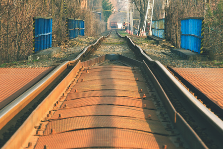 crooked old railway track railingの写真素材