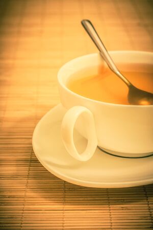 cup of tea on a bamboo matの写真素材