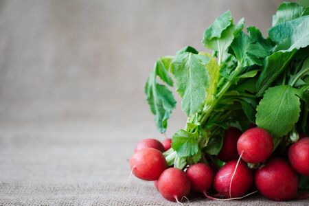 radishes on a brown background