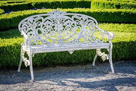 garden bench on a green backgroundの写真素材