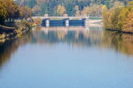 Autumn view of the water weirの写真素材
