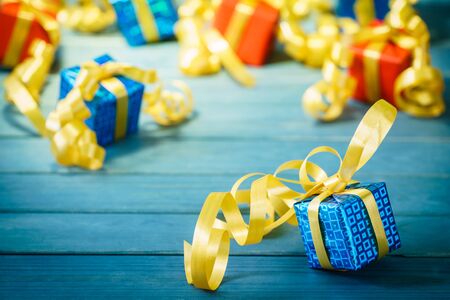 blue gift with yellow ribbonの写真素材