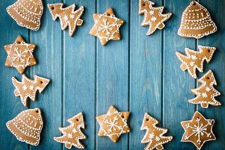 painted honey gingerbread on a blue wooden background