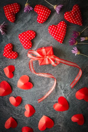 red valentine hearts on wooden backgroundの写真素材