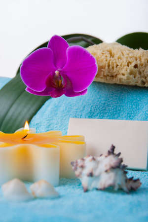 composition of toiletries, shells, soaps, sponges with an orchidの写真素材