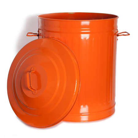 An orange, vintage garbage with lid on the sideの写真素材