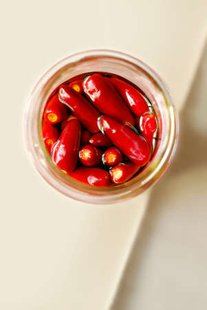 red peppers preserved in oilの写真素材