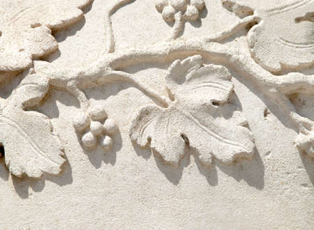 italian grapevine bas relif on stone