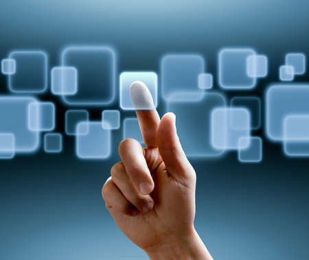 hand pushing a button on a touch screen interface hand pushing a button on a touch screen interface