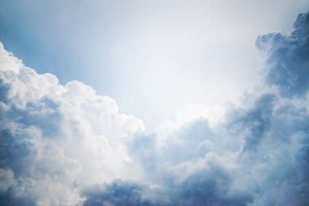 dramatic cloudscape with sunlight in the background