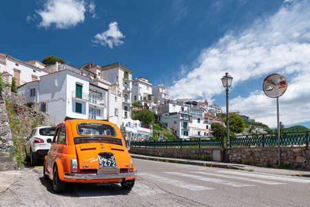 Amalfi, Coast, Italy. May 27th, 2020. An old style retro Fiat 500, parked along the road to Positano.のeditorial素材