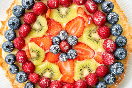 Homemade Shortcrust pastry cake with mixed berries, raspberries, strawberries and blueberries,の写真素材