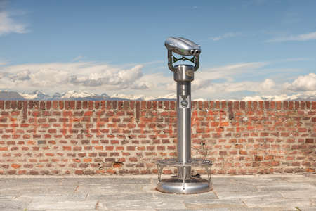 Turin, Italy. May 12th, 2021. Wall and coin-operated binoculars on the Monte dei Cappuccini viewpoint.のeditorial素材