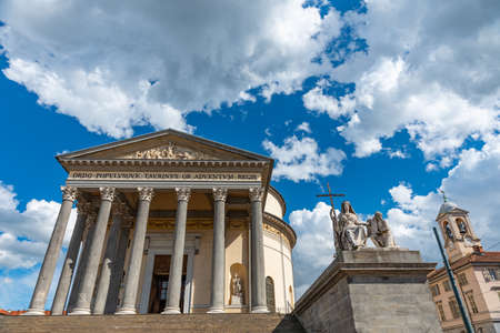 Turin, Italy. May 12, 2021. View of the Colonnade of the Church of the Great Mother of God against a deep blue and cloudy sky.のeditorial素材