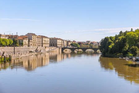 Turin, Italy, May 12th, 2021. Generic view of the Po river with the Vittorio Emanuele I Bridge in the distance in the background.のeditorial素材