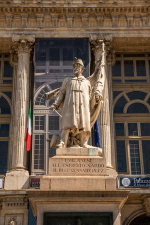 Turin, Italy. May 12th, 2021. Statue depicting a soldier of the Sardinian Army of the 1800s with an italian flag in front of Palazzo Madama in Piazza Castello.のeditorial素材