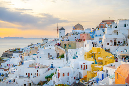 Oia village on Santorini island, Greece at sunset.の写真素材