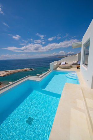 Swimming pool in luxury villa on Santorini island, Greeceの写真素材