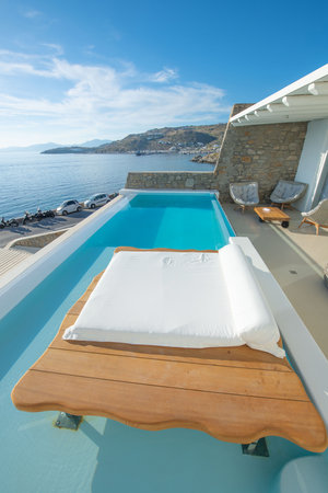 Swimming pool in luxury villa on Santorini island, Greeceの写真素材