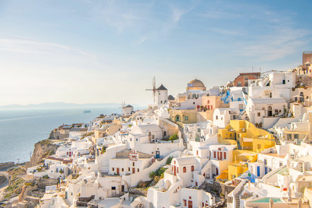 White architecture on Santorini island, Greece. Beautiful landscape at sunset.の写真素材