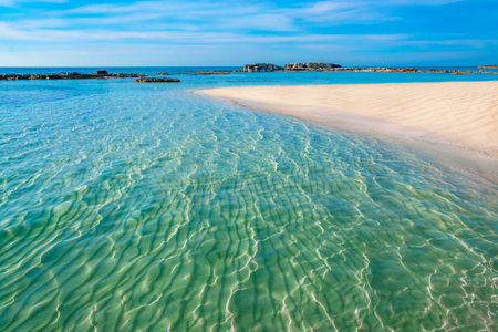 Beautiful sandy beach with turquoise sea water and blue sky, Sardinia island, Italyの写真素材