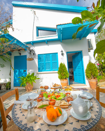 Traditional Greek breakfast on the terrace of a traditional Greek house.の写真素材