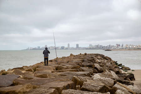 Mar del Plata skyline Fisherman on the quayの写真素材