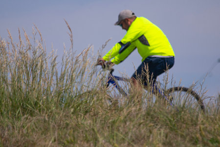 Biker riding his bike on the roadのeditorial素材