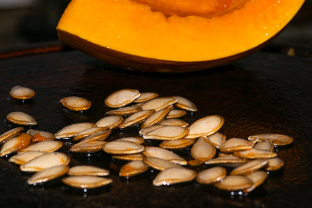 Pumpkin seeds on the tableの写真素材