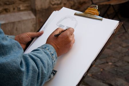 Hand of an artist who is working at Montmatre, Parisの写真素材