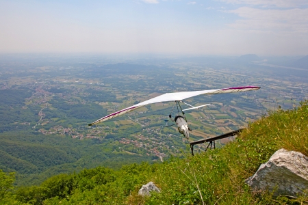 GEMONA, ITALY- JULY 2012: Julia Burlachenko competes in the Italian Open-2012 hang gliding competitions at Gemona on July 17, 2012 near Gemona, Italyのeditorial素材