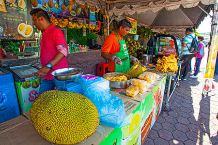 KUALA LUMPUR, MALAYSIA, - January 24, 2020: Jack fruit vendor near the Batu cavesのeditorial素材