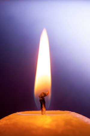 Round Candle isolated on the black backround