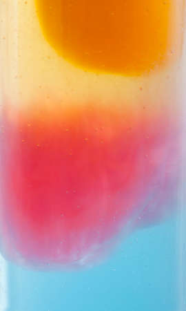 Shampoo closeup - Bubbles on mixed shampoo background