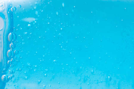 Shampoo closeup - Bubbles on blue backgroundの写真素材