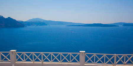 Beautiful view of famous romantic white town in Santorini Island, Greeceの写真素材