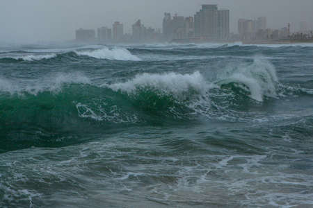Big wave with sea foam and bright Turquoise water