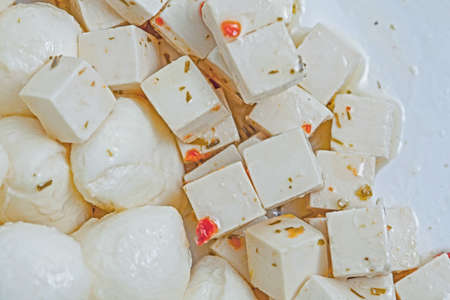 Assortment of cheese, feta and mozzarella, background